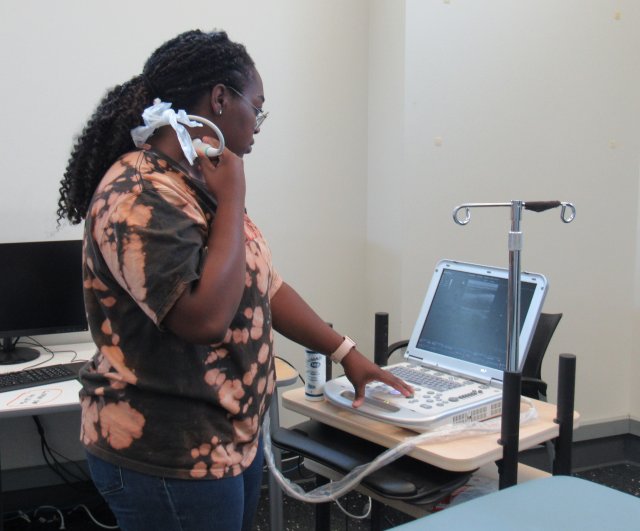 Zaria Opara with ultrasound machine